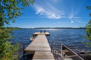 Algonquin Nipissing Cottage dock with view over the lake on a sunny day