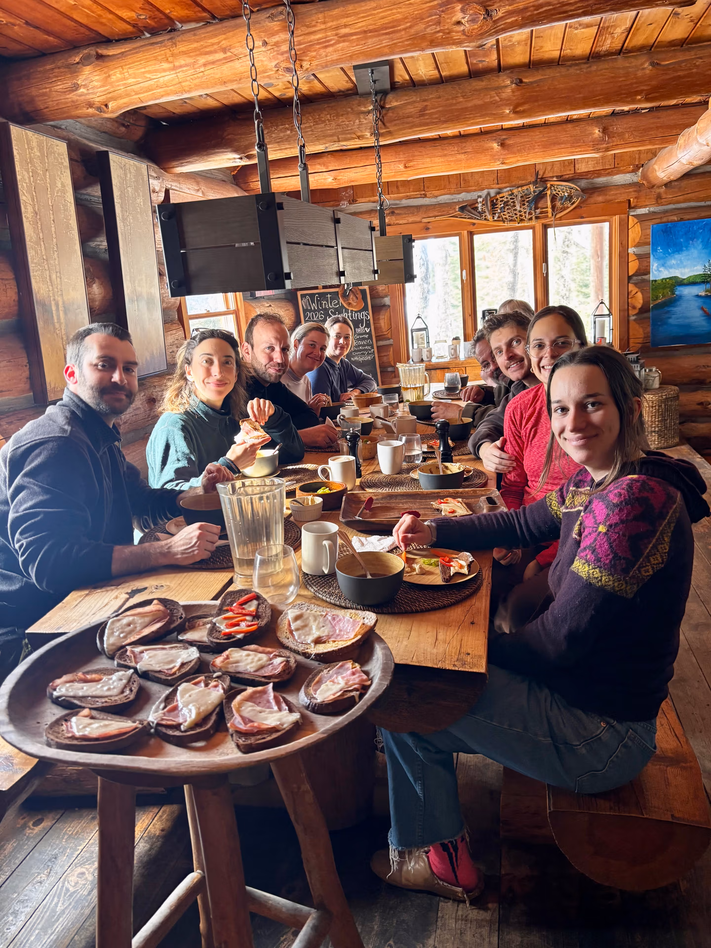 Group lunch of hot soup and warm bread at the Log Cabin after a morning on the trails