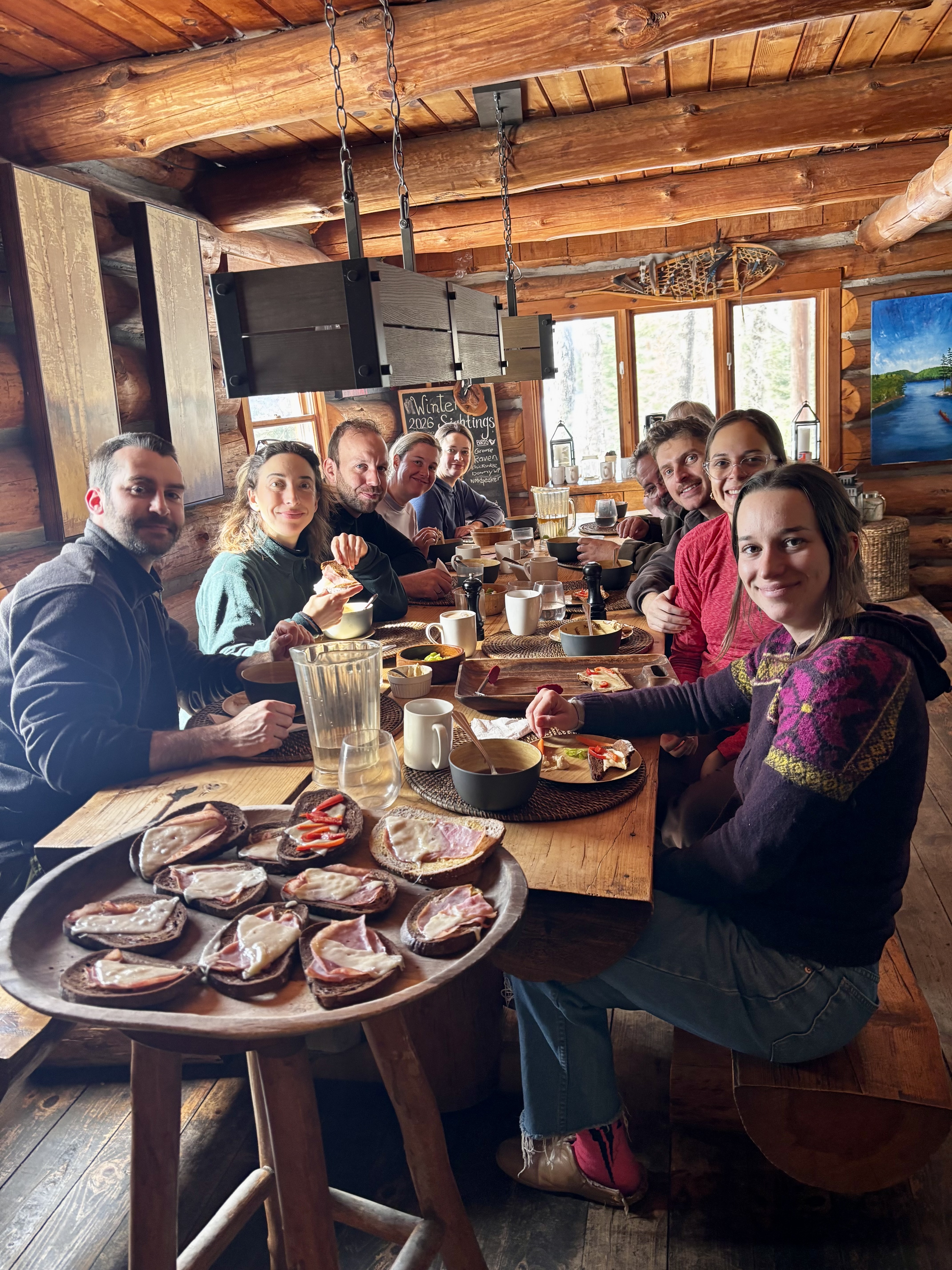 Group lunch of hot soup and warm bread at the Log Cabin after a morning on the trails
